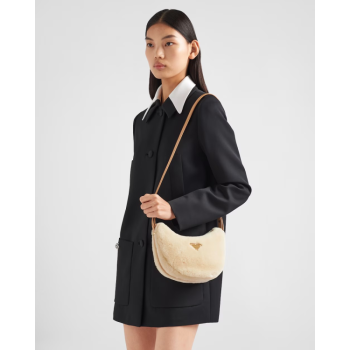 Prada Arqué shearling and leather shoulder bag