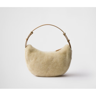 Prada Arqué shearling and leather shoulder bag